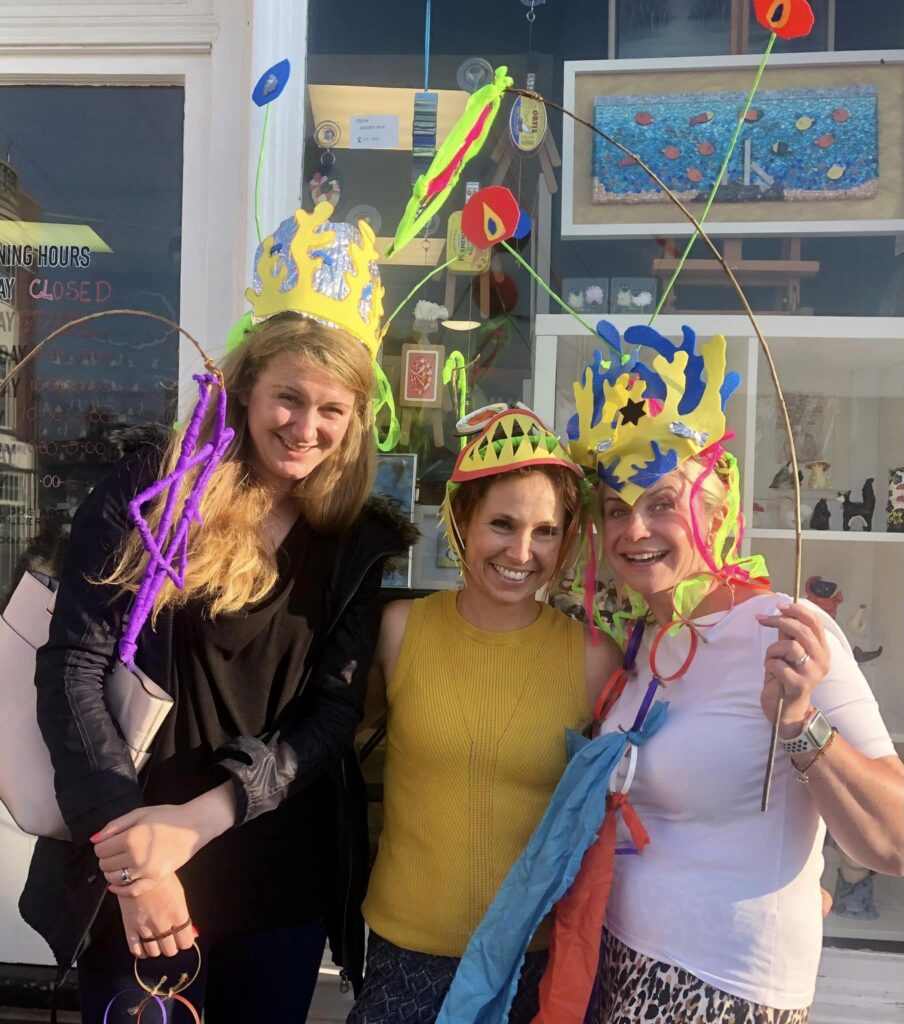 Participants wearing their Sea Creature hats and decorations created at the Sea Dog Gallery in Exmouth at the Weird Sticks family workshop