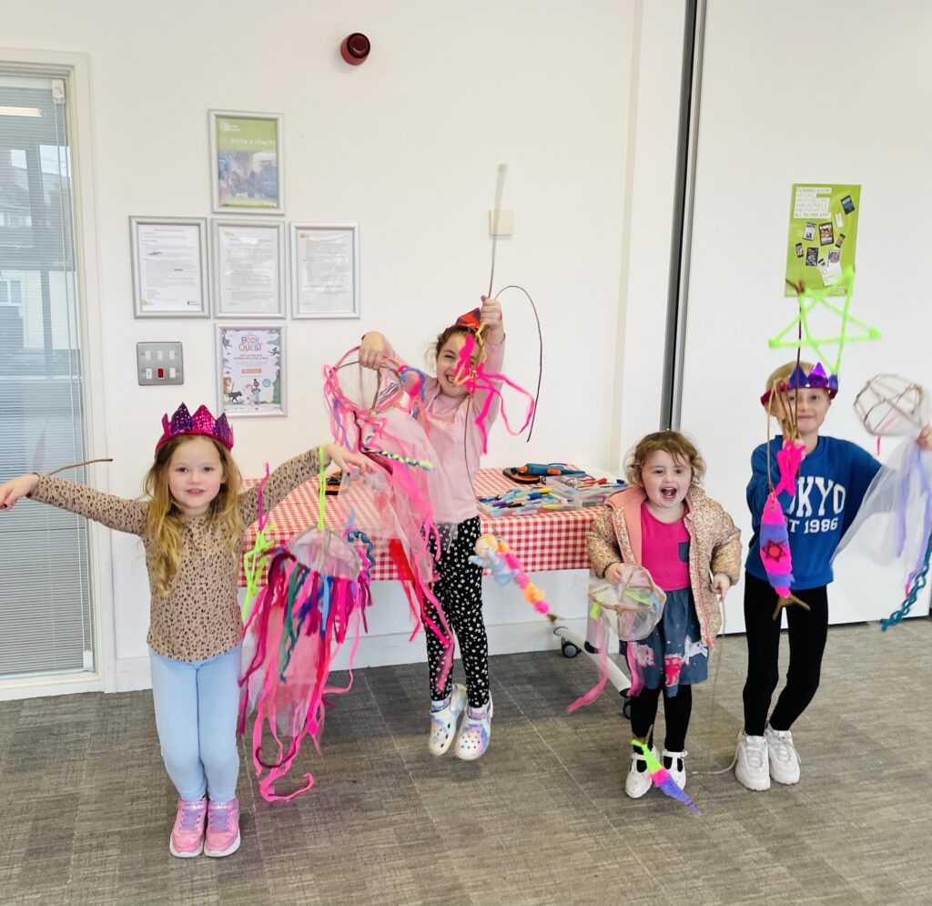 Four children displaying their sea creature creations made with Weird Sticks in Cullompton
