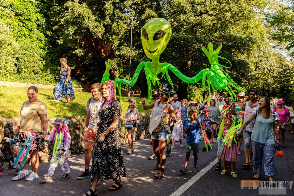 Giant Alien puppets created by Weird Sticks CIC in the Exmouth Festival samba parade 2024