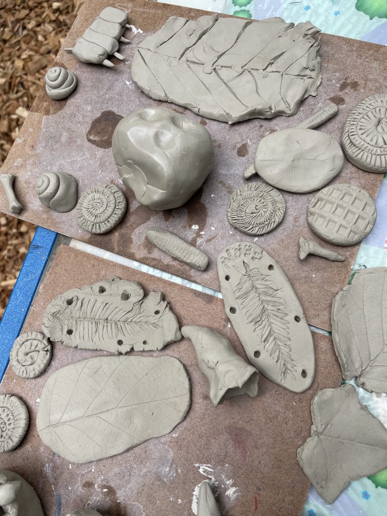 Clay creations made with Weird Sticks at Play Torbay as part of the Geopark Gateway