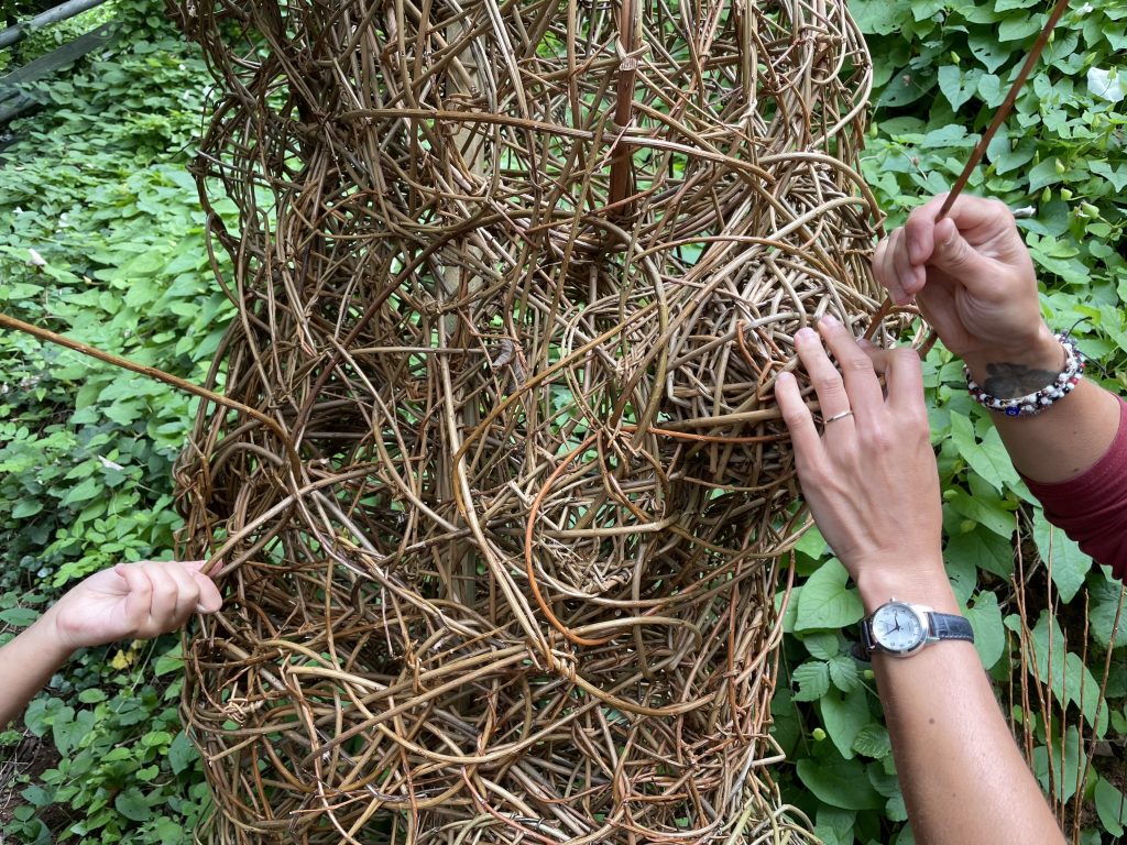 Weird Sticks working with attendees at Play Torbay to create the Geopark Gateway