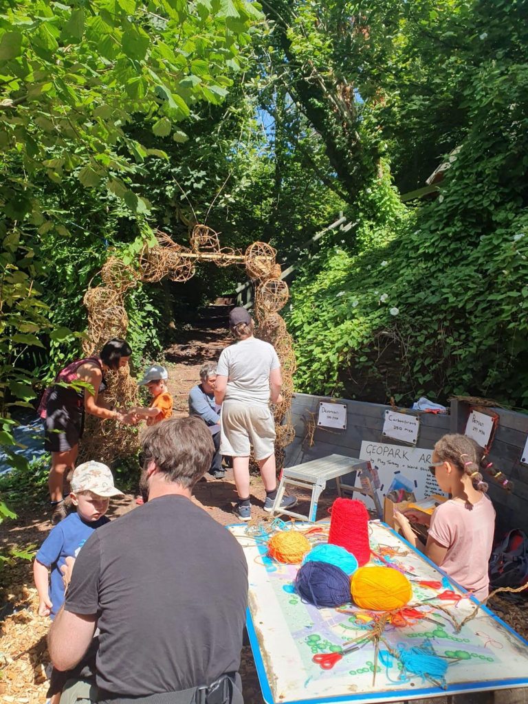 Weird Sticks working with attendees at Play Torbay to create the Geopark Gateway