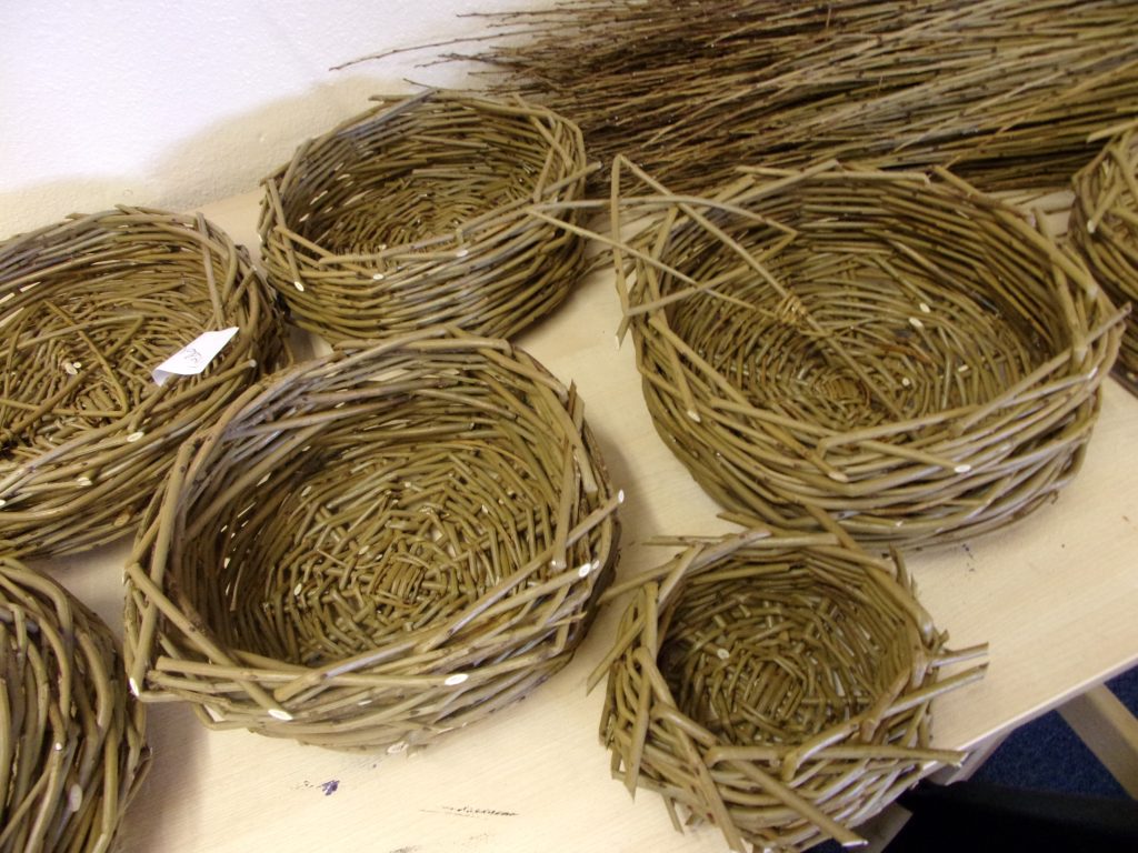 Willow baskets created by participants at HMP Channings Wood during a Weird Sticks workshop as part of the Open Door Project